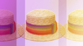 Three straw hats with rainbow bands displayed side by side against a purple gradient background.