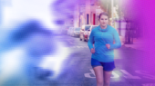 A person in blue athletic wear jogs down a street lined with parked cars, with a purple and blue blurred overlay effect on the image.