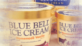 Two containers of Blue Bell Ice Cream, labeled "Homemade Vanilla," one large and one small, are displayed with a partially obscured third container in the background.