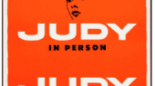 A poster for judy garland 's musical " in person."