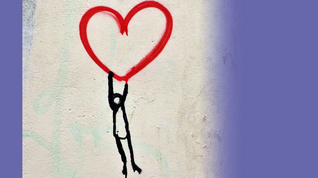 A graffiti of a person and a heart