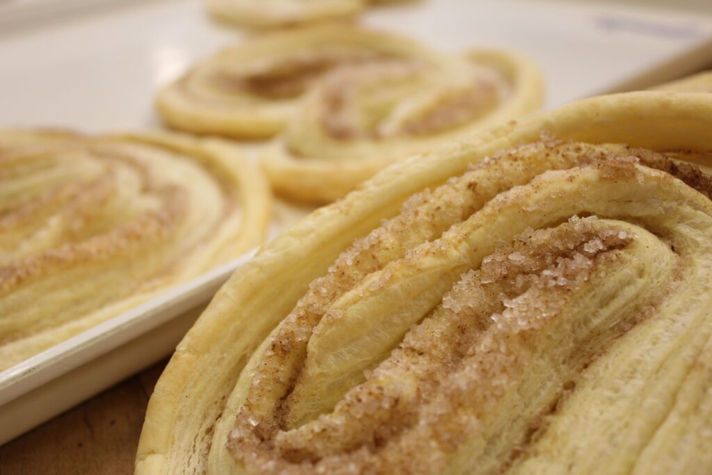 A close up of some pastries on a plate