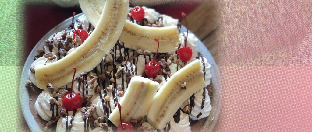 Ice cream with bananas and cherries